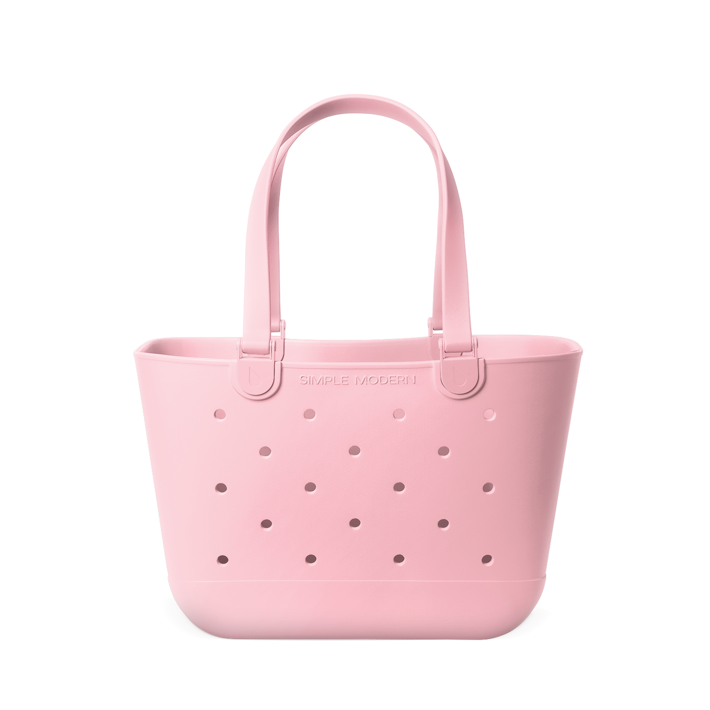 Soft pale pink tote bag with mauve perforated detailing across the front for subtle contrast