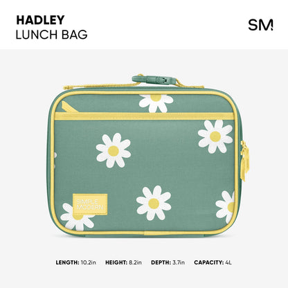 Hadley Lunch Bag in soft sage green with golden yellow trim, piping, and zippers, featuring white daisy flowers with yellow centers